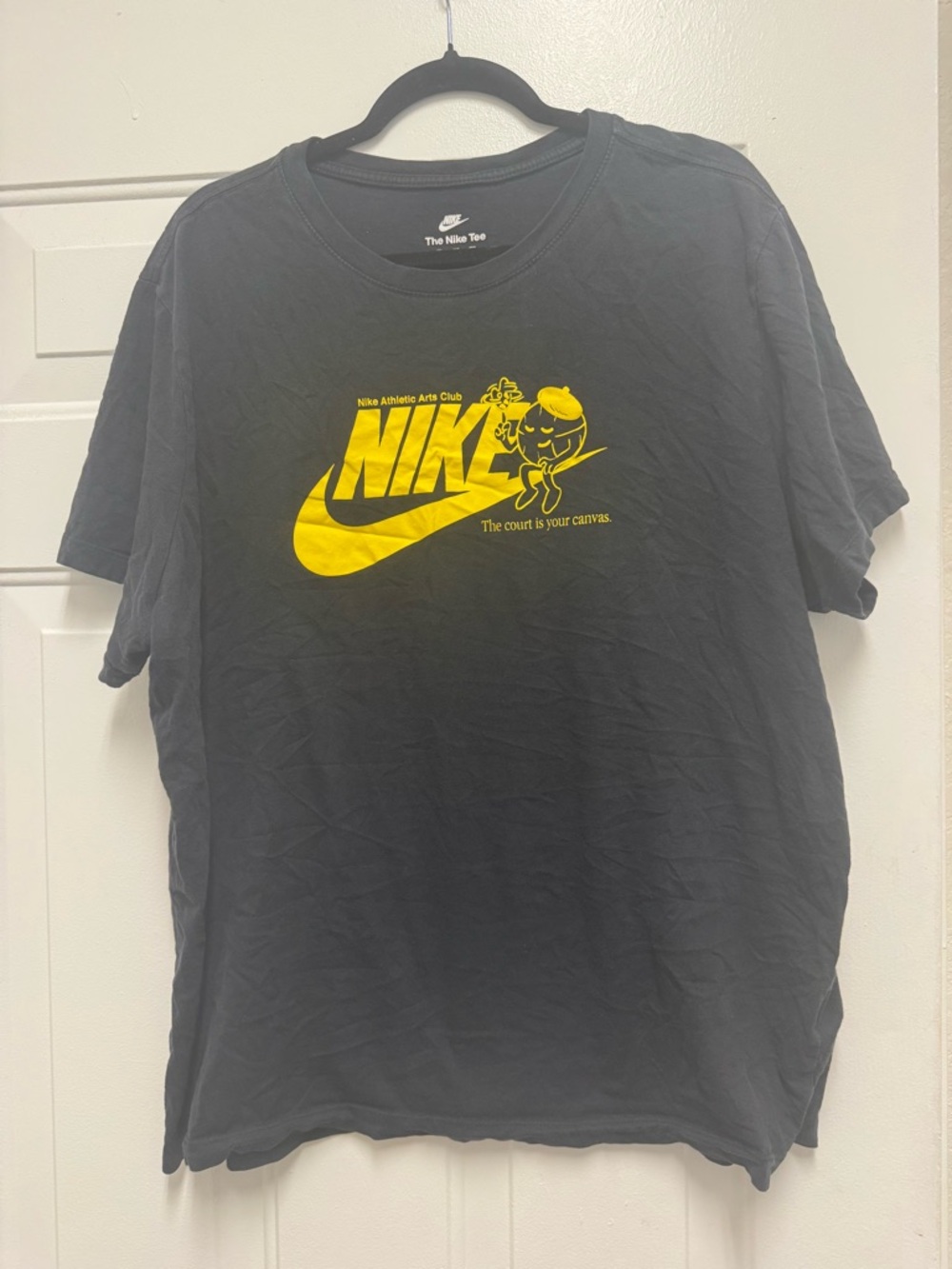 Nike Men’s Black Tee with Yellow Graphic